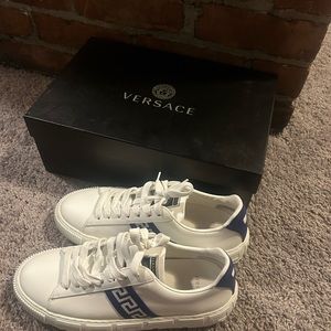 White and blue Versace shoes